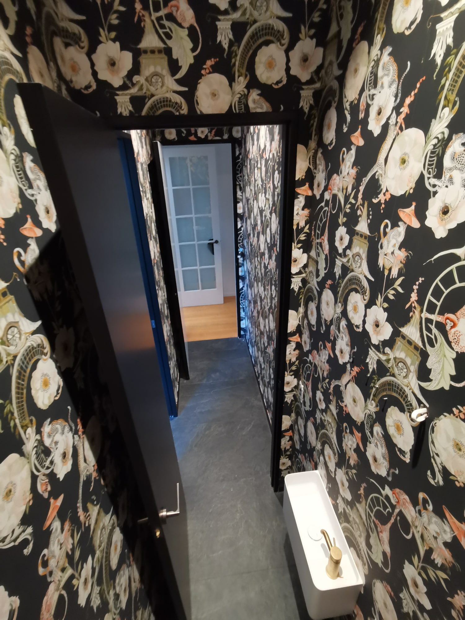 Wallpaper installed across a feature wall in an Auckland home.